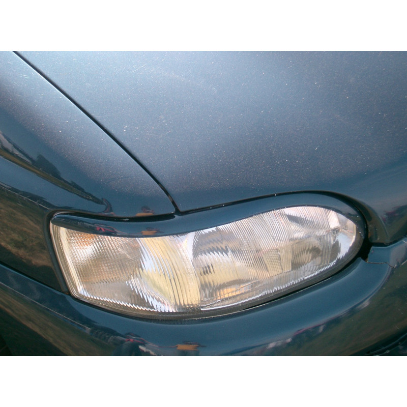 Palpebre per fari 1995-2010 FORD Escort 92-00 (Cod. TF-BFT00489)