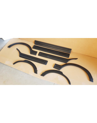 Parafanghi +modanature portiere Peugeot 205 5 porte GTI Look (Cod. O-WA027)