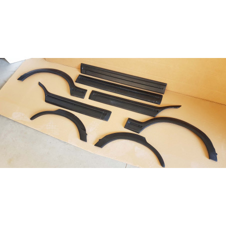 Parafanghi +modanature portiere Peugeot 205 5 porte GTI Look (Cod. O-WA027)