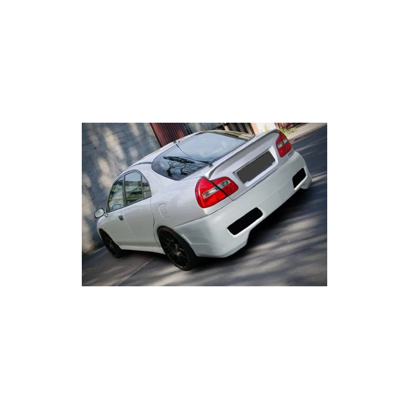Paraurti posteriore Mitsubishi Carisma 96-99 (Cod. S-MCR96-R-01-C)